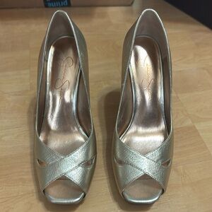 Gold open toe pumps